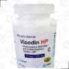 A bottle of vicodin hp with white background You can buy vicodin hp online